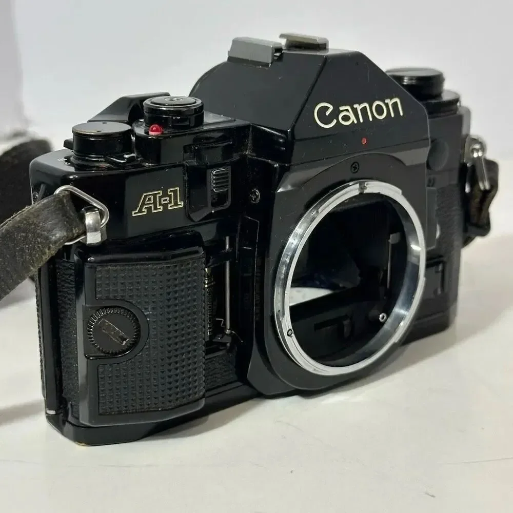 Vintage Canon A-1 Black 35 mm SLR with Strap/ Body Only
